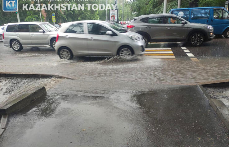 A heavy downpour flooded the streets of Almaty