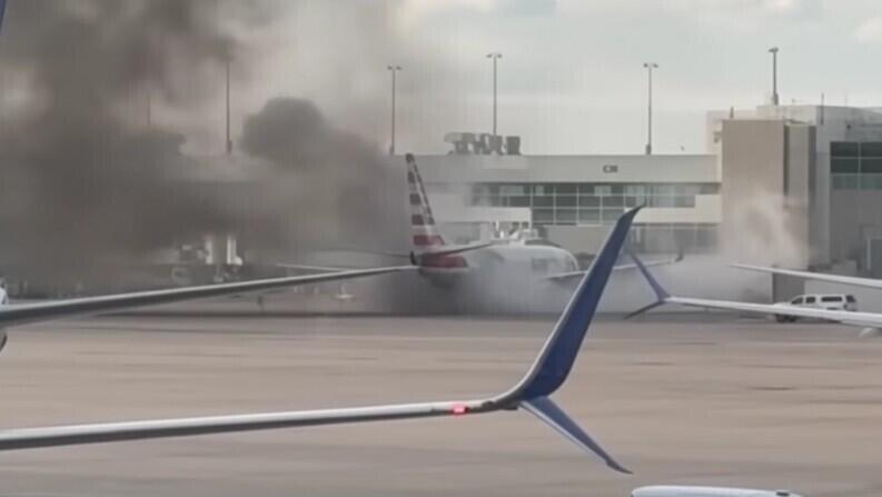 American Airlines plane engine catches fire at Denver airport